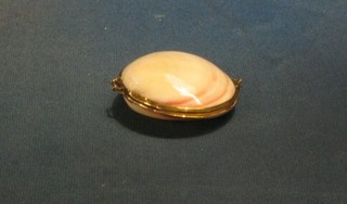 A lady's purse formed from 2 sea shells