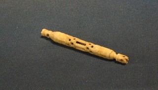 A carved ivory needle case, the top set a Stanhope "Views of Brighton - The Grand Hotel, The Pavilion, The Chain Pier, West Pier, Aquarium and Aquarium Entrance"