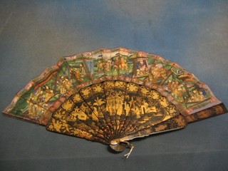 A fine quality 19th Century Oriental lacquered fan, the tips with painted panels decorated court figures with applied heads