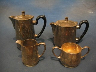 A silver plated hotelware 4 piece tea service comprising teapot, hotwater jug, twin handled sugar basin and cream jug