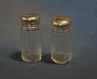 2 pin jars with silver lids