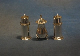 A pair of Edwardian silver cylindrical pepperettes Birmingham 1902 and a Georgian style pepper (legs bent)