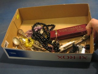 A mouth organ and a small collection of costume jewellery etc