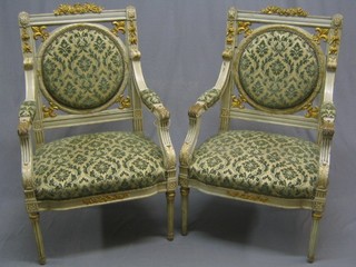 A pair of 19th Century French open arm salon carver chairs raised on turned and fluted supports