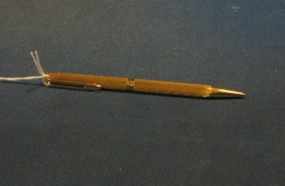 A Waterman ball point pen contained in a gold plate case