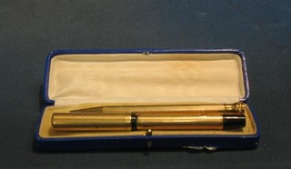 A 14ct rolled gold fountain pen and a do. propelling pencil