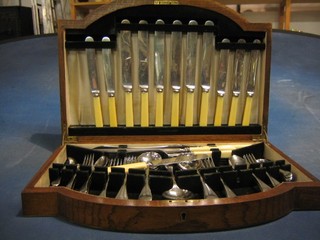 A part canteen of chromium plated Old English pattern flatware contained in an oak box