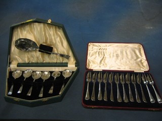 A set of 12 silver plated Old English pattern pastry forks, cased and a 6 piece sweet service, cased