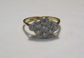 A lady's 18ct gold dress ring set 9 diamonds (0.86ct)
