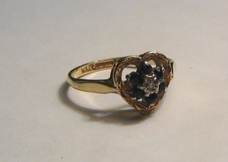 A lady's modern 9ct gold dress ring set black and white stones