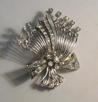 A lady's 18ct white gold and diamond set spray brooch set numerous diamonds