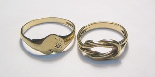 A lady's 9ct gold heart shaped signet ring and 1  other gold ring