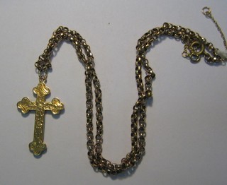 A 9ct gold St James' cross hung on a gold belcher link chain
