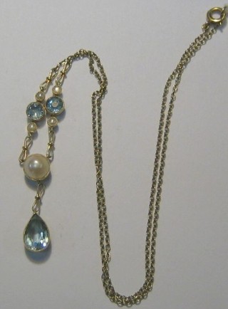An Edwardian 15ct gold necklet set demi-pearls and aquamarine