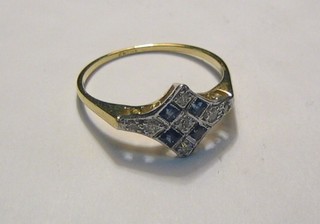 A lady's 18ct yellow gold dress ring set 4 sapphires and 6 diamonds 