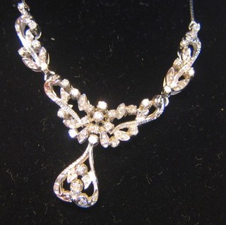 A lady's 18ct white gold necklace set diamonds