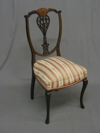 An Edwardian inlaid mahogany dining chair with pierced shaped splat back and upholstered seat, raised on cabriole supports