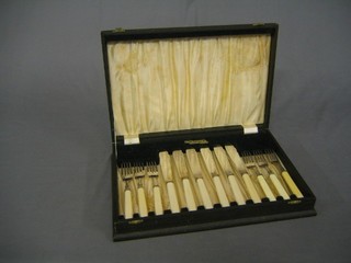 A cased set of 6 fish knives and forks