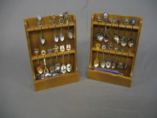 2 wooden boards containing a collection of various spoons