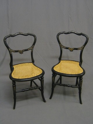 A handsome pair of Victorian lacquered and inlaid mother of pearl balloon back bedroom chairs with woven cane seats (1 with old repair top left hand rail