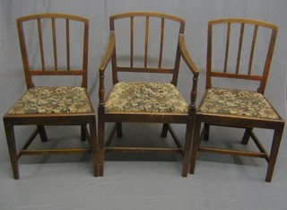 A set of 3 18th/19th Century Country oak stick and bar back dining chairs (1 carver, 2 standard)