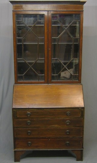 An Edwardian inlaid mahogany bureau bookcase, the upper section with moulded cornice and adjustable shelves, the fall front revealing a well fitted interior above 4 long graduated drawers raised on bracket feet 36"