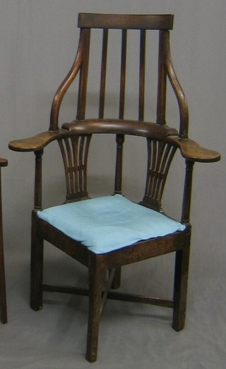 An 18th/19th Century oak stick and rail back corner chair