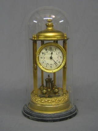 An Edwardian  gilt cased 400 day clock with porcelain dial complete with glazed dome