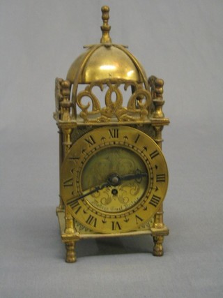 A 1950's Smiths  8 day reproduction lantern clock contained in a gilt metal case 7"