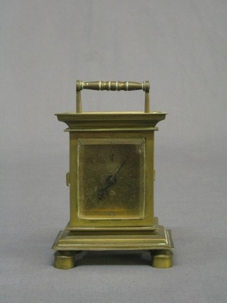 An early English fusee carriage clock with rectangular 2 1/2" silvered dial and Roman numerals, contained in a gilt metal case, the back plate signed Charles Cummins of London