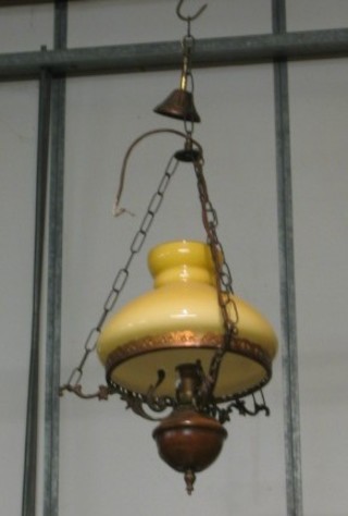 A reproduction wooded and metal light fitting in the form of a 19th Century hanging oil lamp