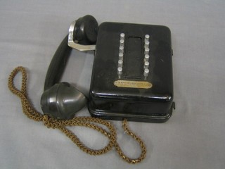 A 1930's metal cased wall mounting internal telephone by the British Home and Office Telephone Co.