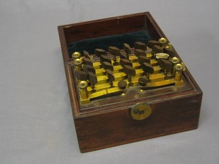 An electrical resistor contained in a mahogany case