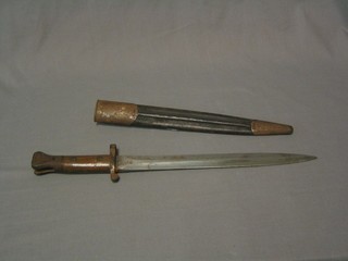 A Victorian Wilkinson's double edge bayonet complete with leather scabbard (type issued to the Royal Flying Corps)