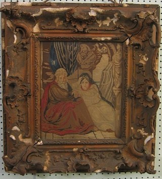 A Berlin wool work panel depicting 2 seated religious figures 12" x 10" in a decorative gilt frame