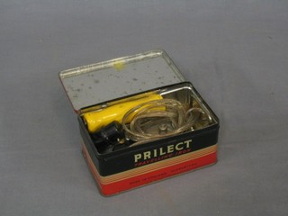 A Prilect travelling iron cased