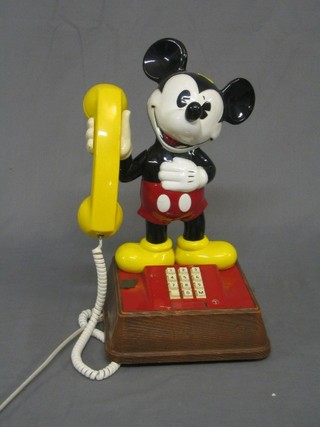 A British Telecom telephone in the form of Mickey Mouse, the base marked Character Telephones TSR8021A