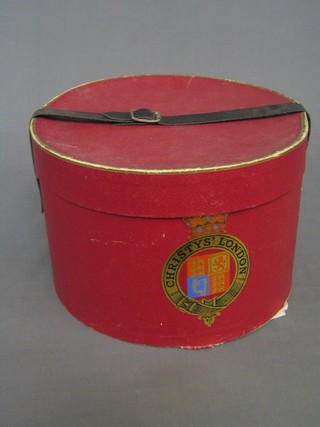 A circular Christys' Hat box
