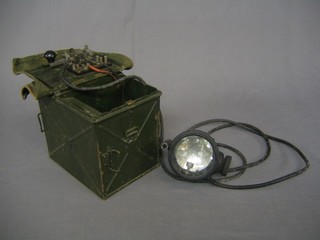 A military issue Morse code signalling lamp