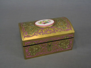 A handsome 19th Century brass and pink lacquered Boulle style domed trinket box, the lid inset an oval porcelain panel with floral decoration 7"