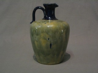 A Royal Doulton blue and green glazed stoneware flagon, the base marked Royal Doulton and impressed 7192, incised RH, 9"