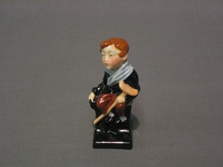 A Royal Doulton Dickensian figure Tiny Tim, 4"