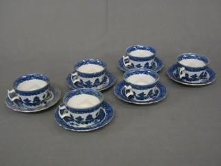 A set of 6 19th Century  blue and white Willow pattern cups and saucers 