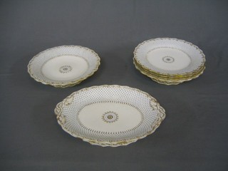 A 19th Century 6 piece porcelain dessert service comprising oval twin handled dish, 2 circular comports and 3 plates, all with blue and white polka dot decoration within gilt borders
