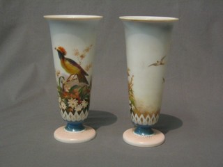 A pair of Victorian opaque glass vases decorated birds 9"