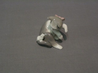 A Lladro figure of a seated cat and mouse, base impressed B44J 3"