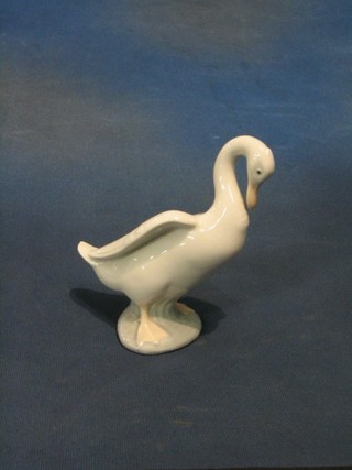 A Lladro figure of a preening goose 5"