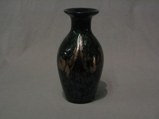 An Isle of Wight green and gold glass club shaped vase 10"