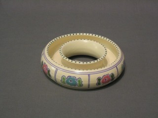 A circular Honiton Pottery flower ring, base marked Honiton Devon, 6"