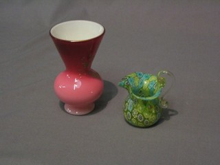 A Victorian trumpet shaped opaque glass vase 4 1/2" and a decorative glass jug 3"